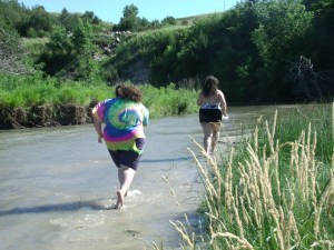 Bela and Gen exploring at the river.