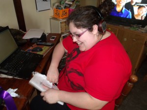 Bela had to work at opening her gift.