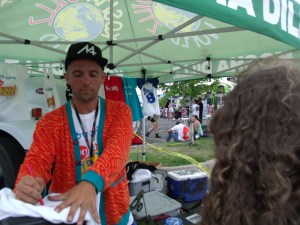 Kosha Dillz was busy signing stuff.